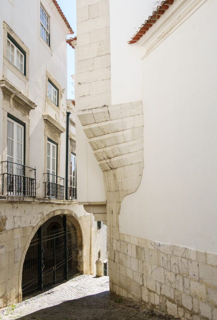 White walls and stone arch